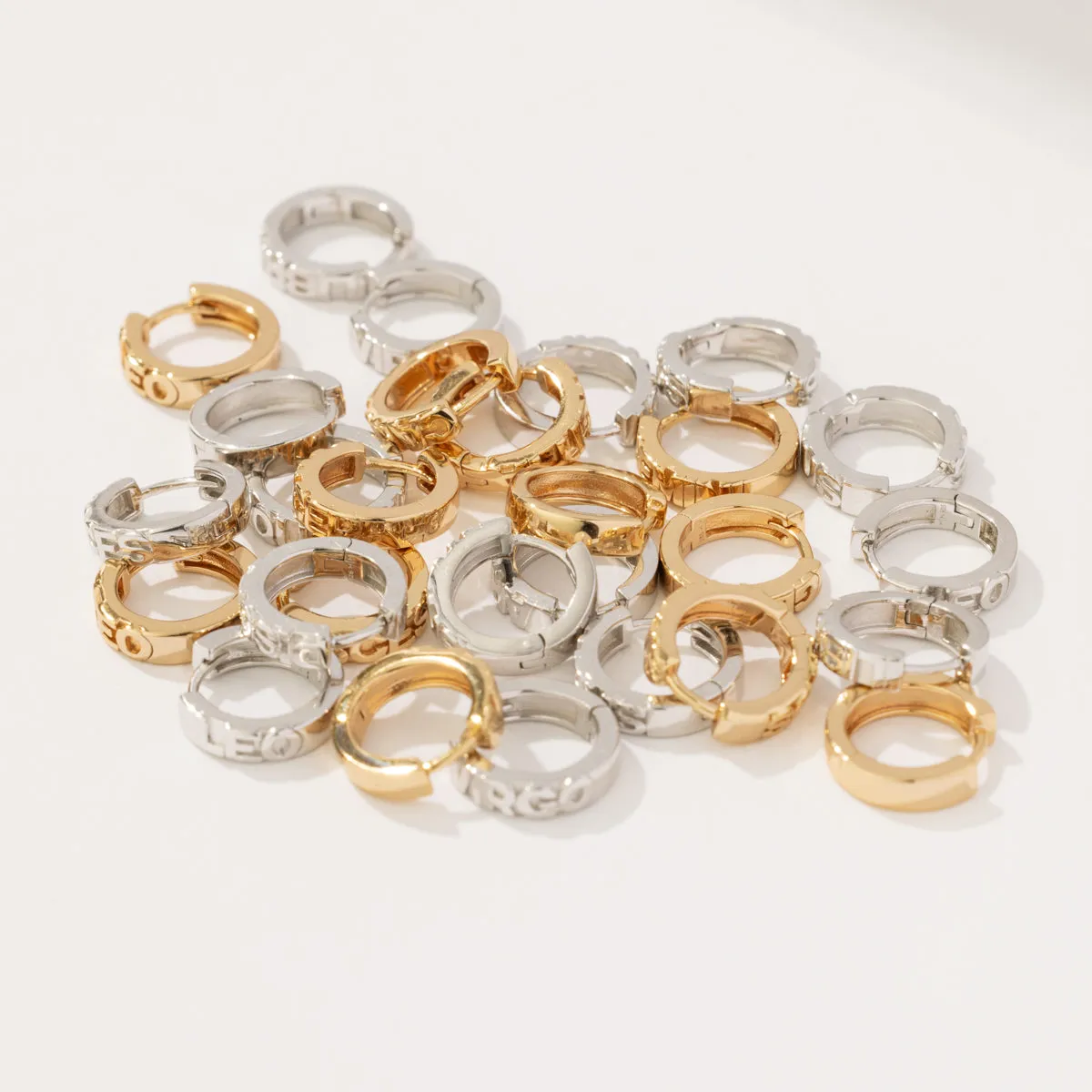 Leo Huggie Hoop Earrings